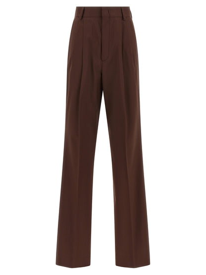Trousers by Armarium for women in virgin wool brown features a tailored silhouette with a tailored straight-leg, defined by its long and a sophisticated .