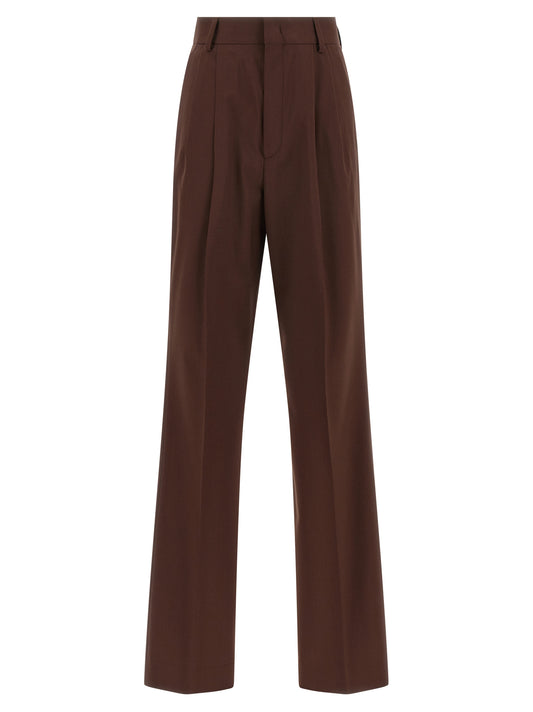 Trousers by Armarium for women in virgin wool brown features a tailored silhouette with a tailored straight-leg, defined by its long and a sophisticated .