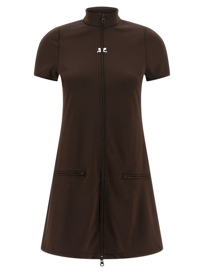 Dress by Courrèges for women in polyester brown & signature features an sultry silhouette defined by a high-neck neckline and short-sleeve, falling to an sultry short mini for a sultry look.
