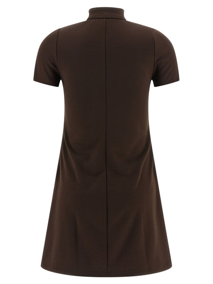Dress by Courrèges for women in polyester brown & signature features a dramatic silhouette, showcasing an elegant high-neck neckline and that flows into a dramatic short mini.