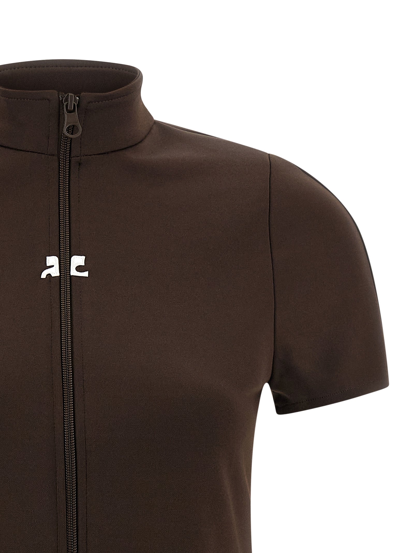 Dress by Courrèges for women in polyester brown & signature features an magnificent silhouette, artfully detailed with a magnificent high-neck neckline and that flows into an magnificent short mini.