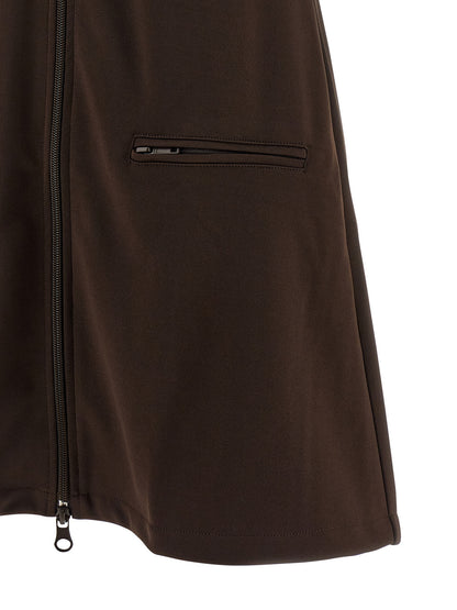 Dress by Courrèges for women in polyester brown & signature showcases a striking silhouette, elegantly detailed with a , refined , and a striking short mini for a striking finish.