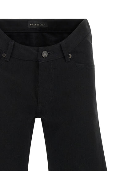 Jeans by Balenciaga for women in denim cotton black & signature features an sartorial straight, flared & wide and long with a mid rise cut for a sartorial finish.