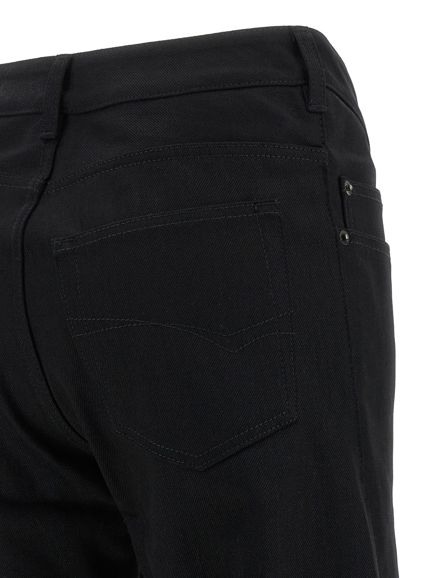 Jeans by Balenciaga for women in denim cotton black & signature presents a tailored silhouette, showcasing a tailored straight, flared & wide and long cut with a refined mid rise for a truly tailored aesthetic.