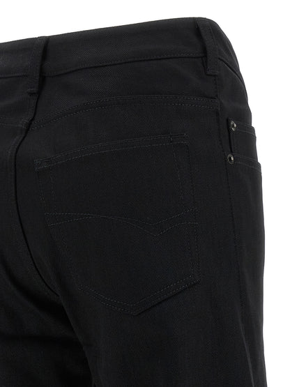 Jeans by Balenciaga for women in denim cotton black & signature presents a tailored silhouette, showcasing a tailored straight, flared & wide and long cut with a refined mid rise for a truly tailored aesthetic.