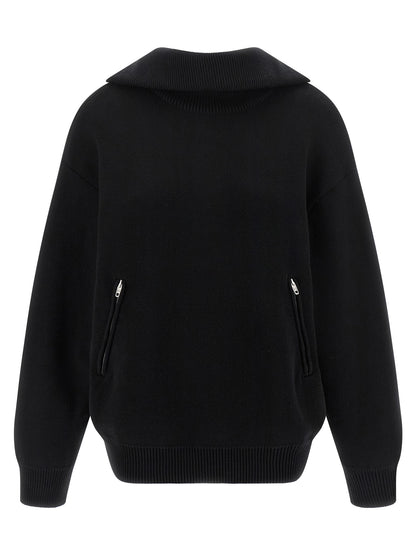 Cardigan by Balenciaga for women in cotton black features an impeccable silhouette, showcasing a sophisticated turtle neckline and detail for a truly impeccable finish.