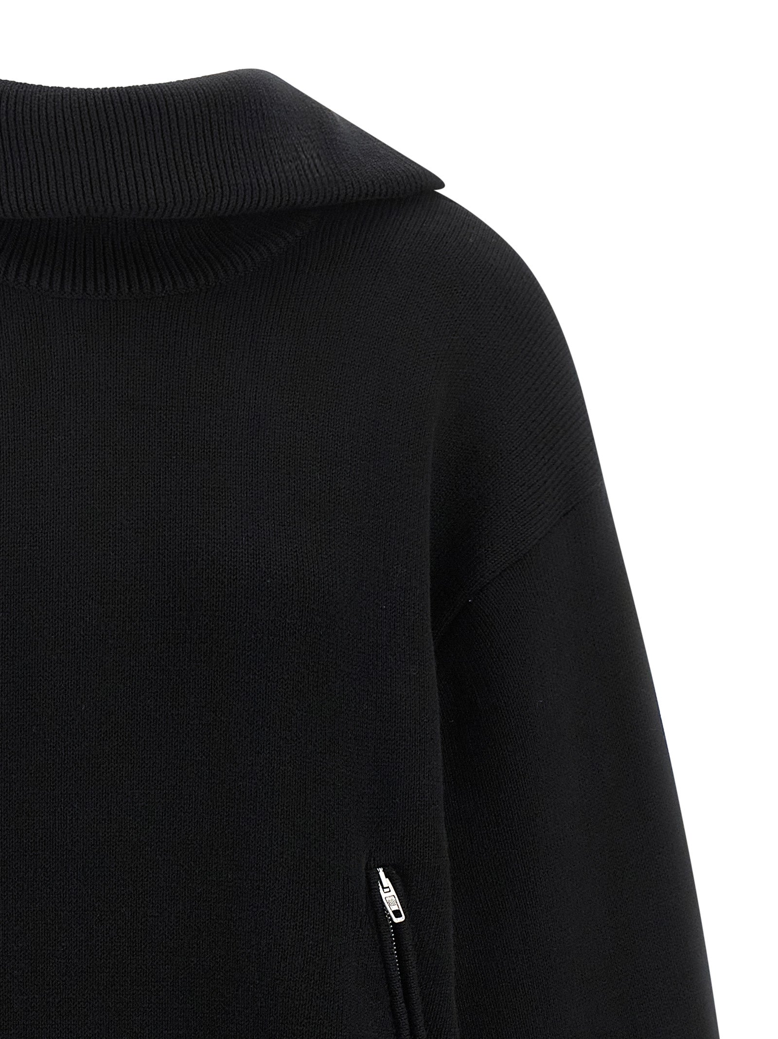Cardigan by Balenciaga for women in cotton black features a nuanced silhouette with a refined turtle neckline and nuanced detailing for a sophisticated look.