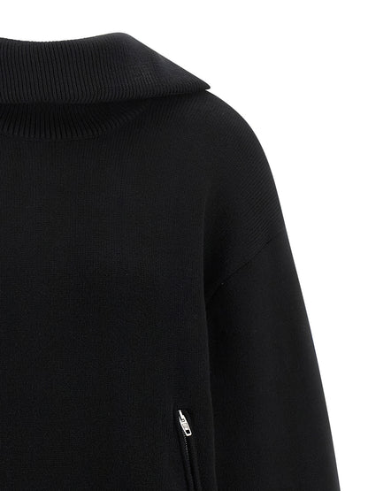 Cardigan by Balenciaga for women in cotton black features a nuanced silhouette with a refined turtle neckline and nuanced detailing for a sophisticated look.