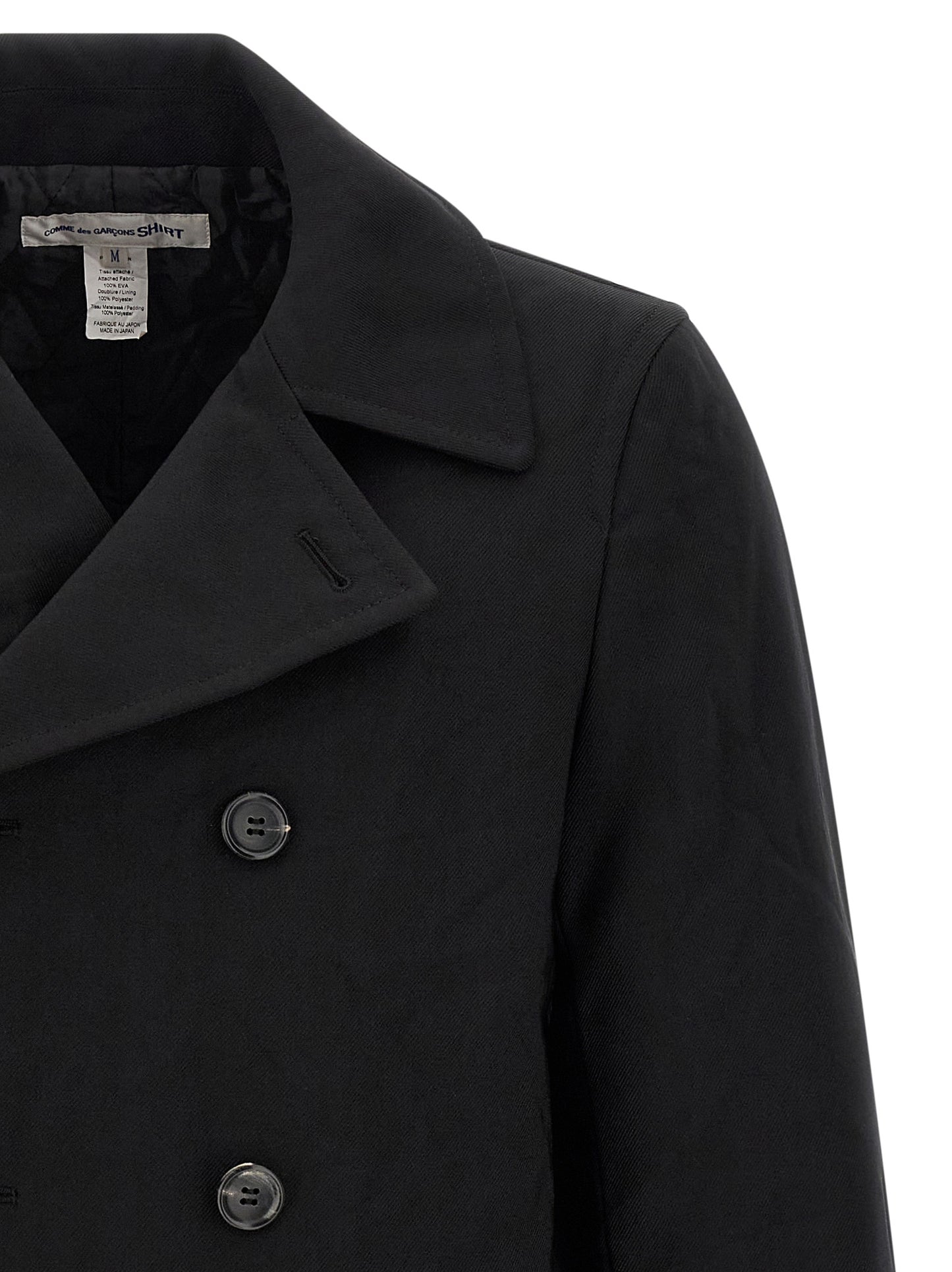 Overcoat by Comme Des Garçons for men in polyester black presents a luxurious silhouette, showcasing a luxurious and sophisticated pockets & insulated for a premium, luxurious look.