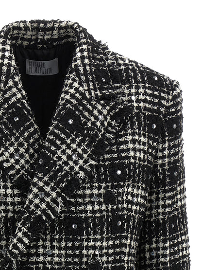 Blazer by Giuseppe Di Morabito for women in acrylic poly cotton tweed bicolour, black & white presents a distinguished silhouette, detailed with a distinguished lapel peak-lapel neckline and distinctive for a truly sophisticated finish.