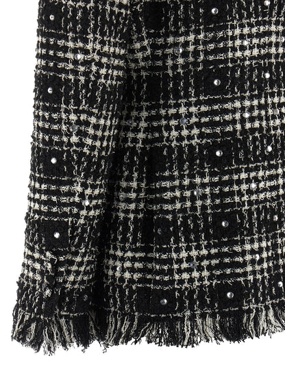 This Blazer by Giuseppe Di Morabito for women in acrylic poly cotton tweed bicolour, black & white presents a tailored silhouette, meticulously tailored with a tailored and distinctive for a tailored finish.