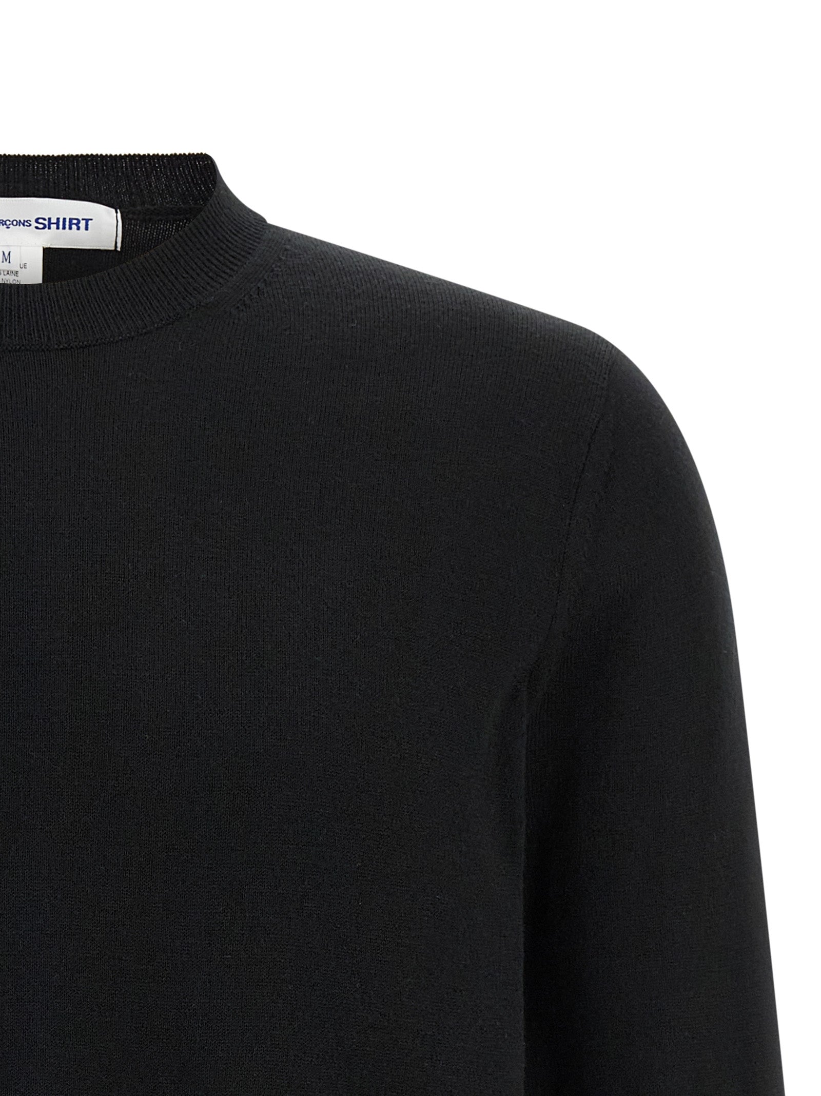 Cardigan by Comme Des Garçons for men in nylon wool & acetate black showcases a luxurious silhouette, meticulously detailed with a sophisticated crew neckline and for a refined finish.
