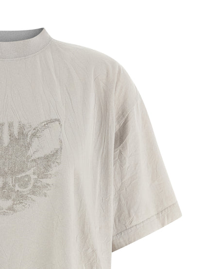 T-Shirt by Balenciaga for women in cotton white showcases a dramatic silhouette, elegantly detailed with a dramatic crew neckline and for a truly dramatic finish.