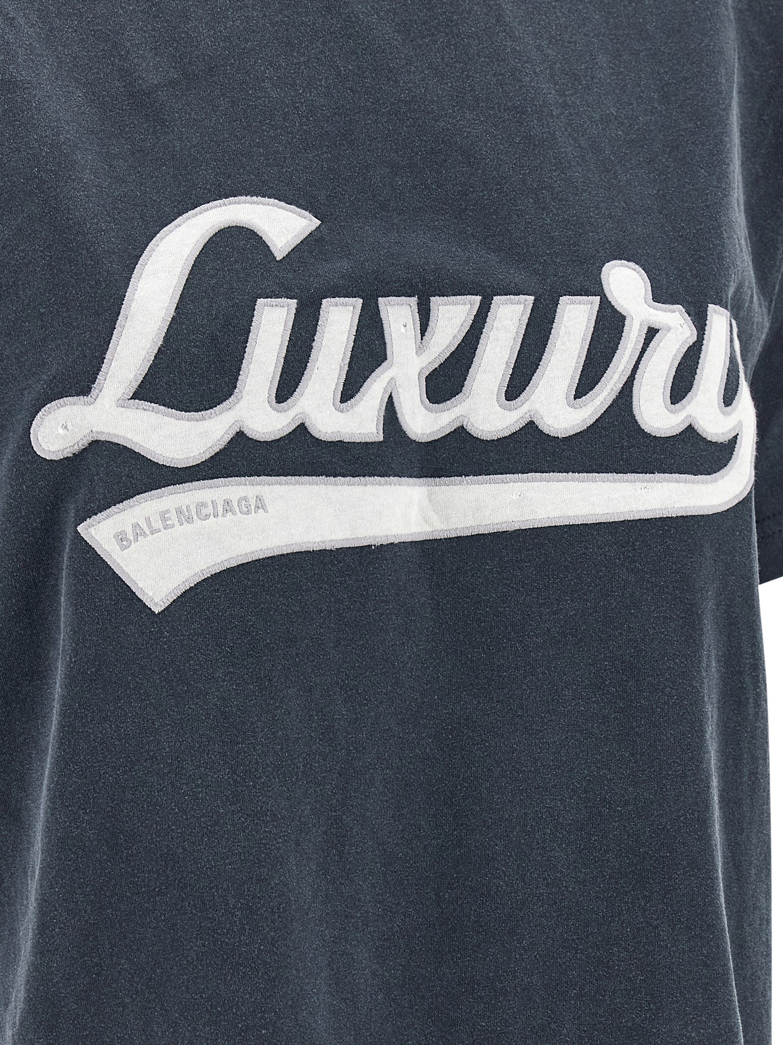 Activewear T-Shirt by Balenciaga for women in cotton blue presents a kinetic silhouette, showcasing the kinetic and alongside functional for a premium, athletic look.