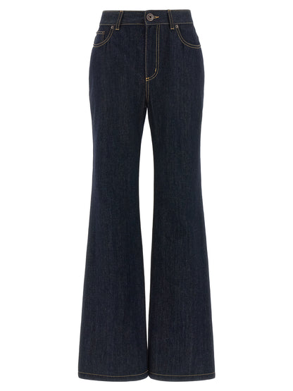 Jeans by Alexander McQueen for women in denim cotton & suede leather blue features an sartorial straight-leg & flared and long with a cut for a sartorial finish.
