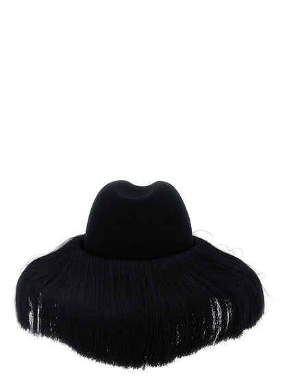 Fedora by Comme Des Garçons for women in wool black presents a ethereal silhouette, showcasing the ethereal craftsmanship and ethereal aesthetic of the Fedora Wool collection.