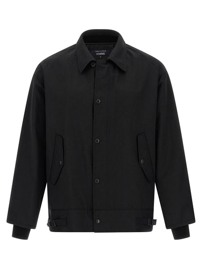 Overcoat by Comme Des Garçons for men in wool & polyester black features an voluminous silhouette, showcasing distinct pockets and a voluminous for a truly voluminous aesthetic.