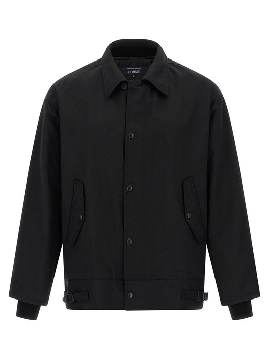Overcoat by Comme Des Garçons for men in wool & polyester black features an voluminous silhouette, showcasing distinct pockets and a voluminous for a truly voluminous aesthetic.
