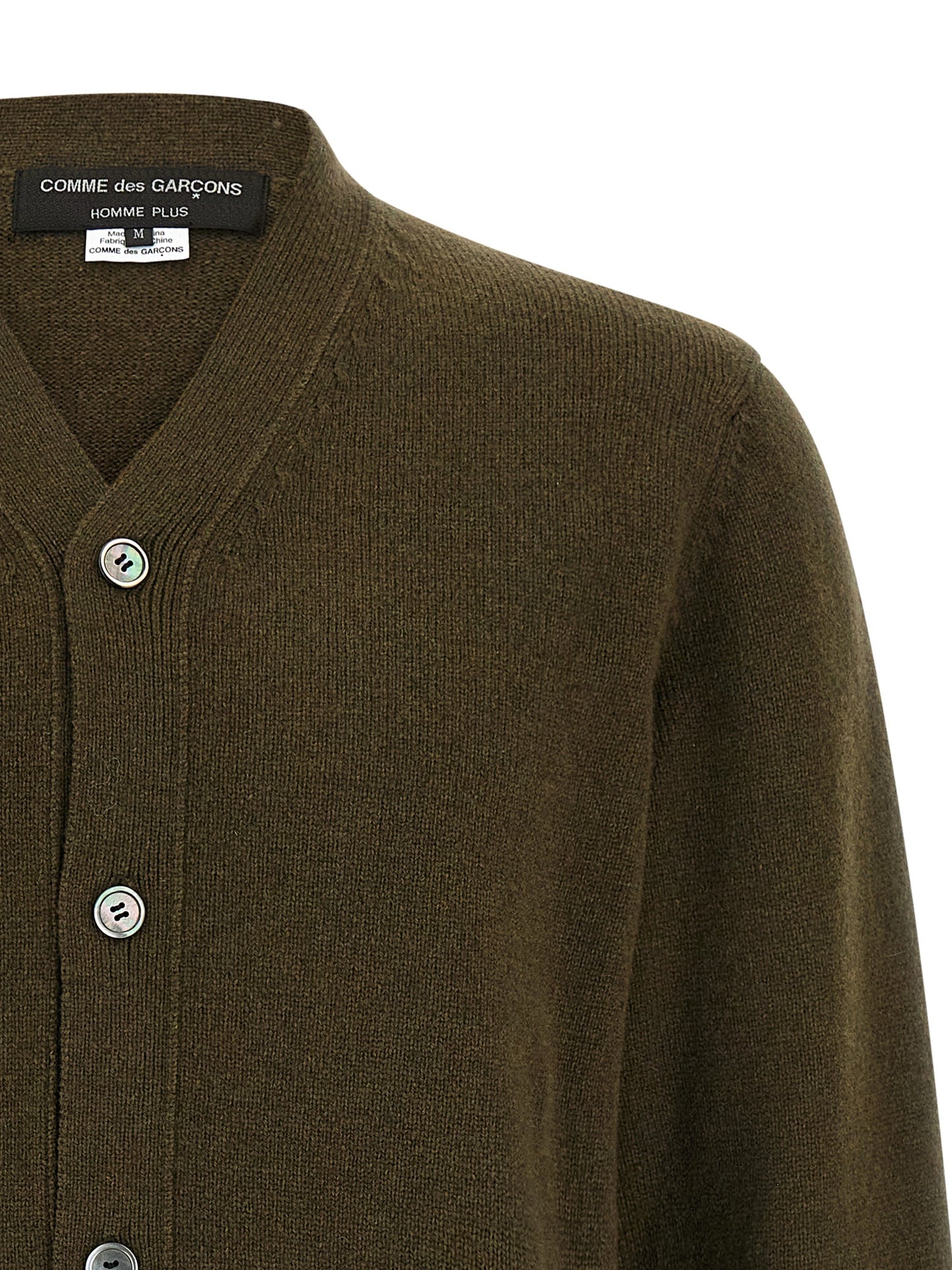 Cardigan by Comme Des Garçons for men in wool & nylon bicolour, green & jacquard showcases a captivating silhouette, artfully detailed with a captivating and v-neck neckline for a truly sophisticated captivating look.
