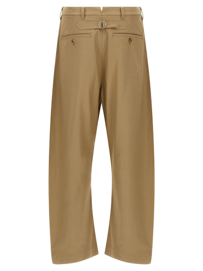 Trousers by Comme Des Garçons for men in cotton beige features a tailored silhouette with a tailored , defined by its long and a sophisticated .