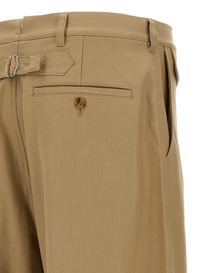 Trousers by Comme Des Garçons for men in cotton beige presents a smart silhouette, meticulously detailed with a smart , a smart long, and a smart .