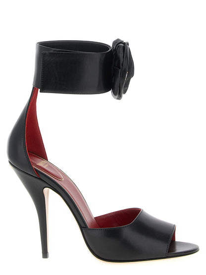 Stiletto Ankle Strap Sandals by Valentino Garavani for women in calfskin & goat leather black, pink, rose & signature features an exquisite silhouette, showcasing the exquisite V Logo Women's Calfskin & Goat Leather Stiletto Ankle Strap Sandals with a stiletto and .