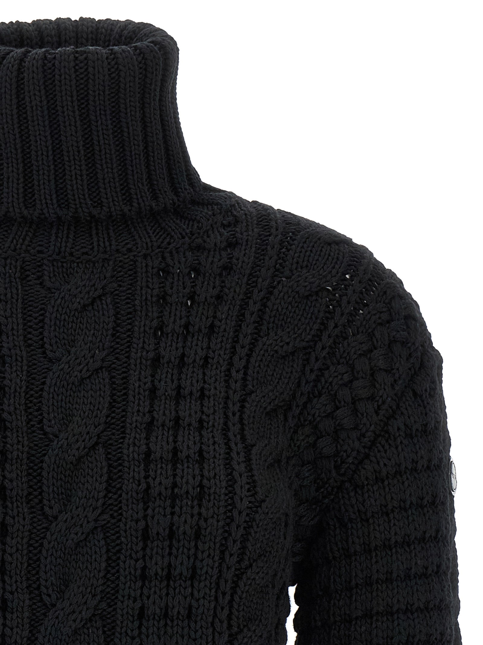 Cardigan by MONCLER GENIUS for women in virgin wool black features a dramatic silhouette, showcasing a sophisticated turtle neckline and dramatic detail for a timeless, premium look.