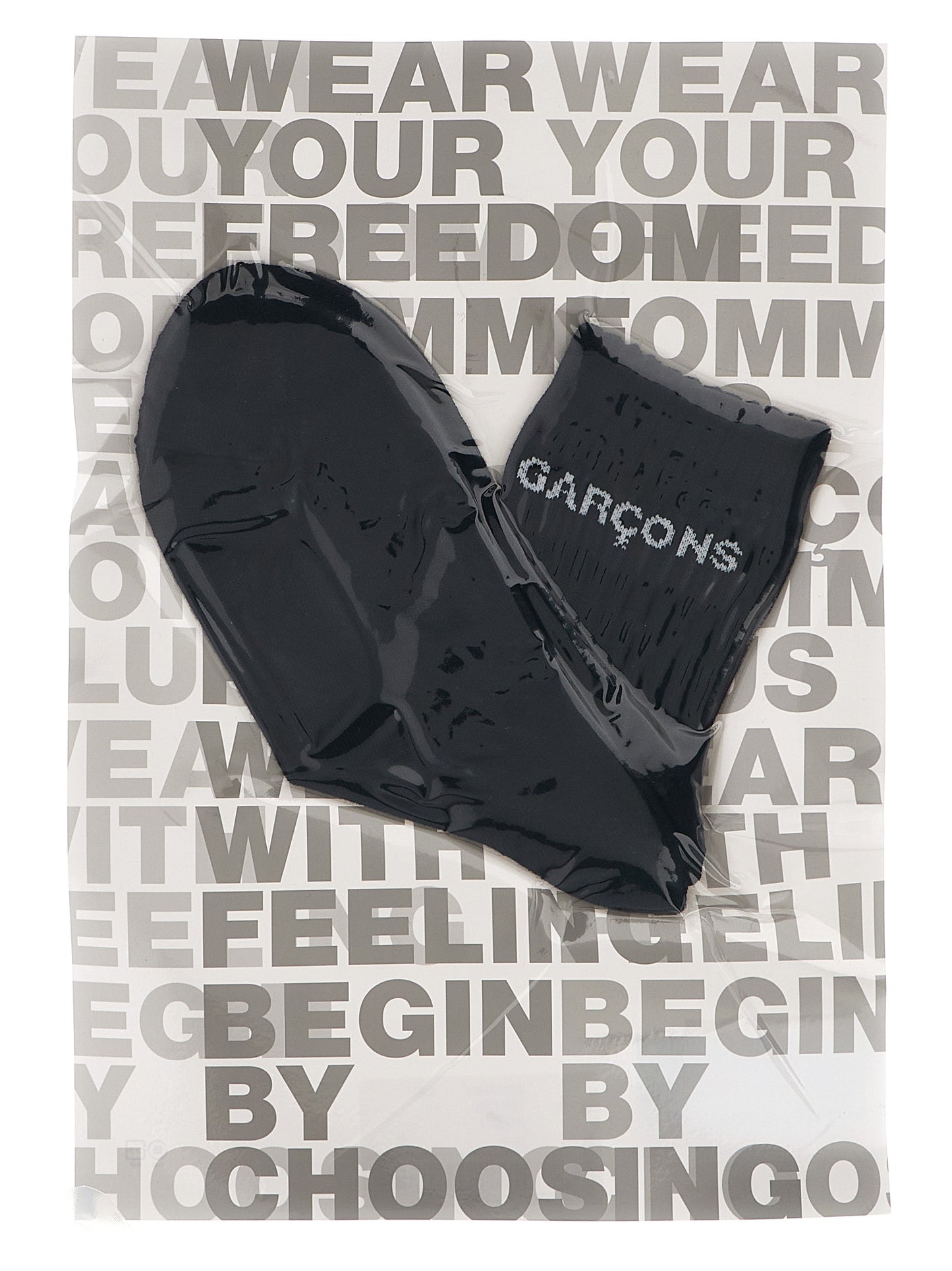 These Socks by Comme Des Garçons for men in cotton bicolour, black & white present a utilitarian silhouette from the Men's Cotton Socks collection, offering a utilitarian fit and refined aesthetic.