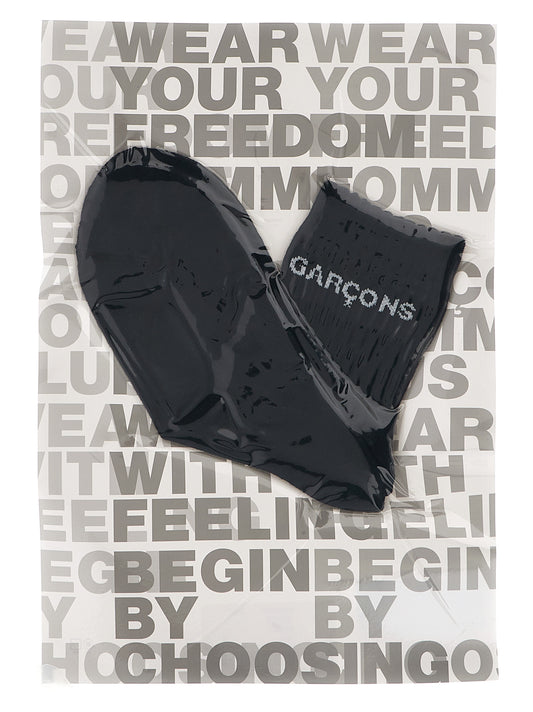 These Socks by Comme Des Garçons for men in cotton bicolour, black & white present a utilitarian silhouette from the Men's Cotton Socks collection, offering a utilitarian fit and refined aesthetic.
