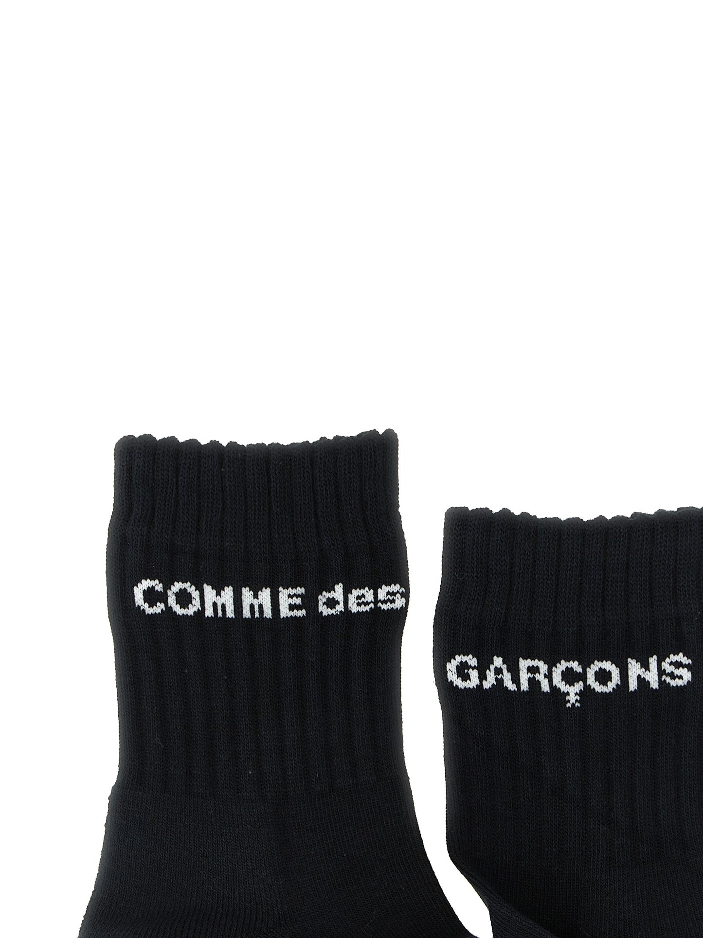 Socks by Comme Des Garçons for men in cotton bicolour, black & white features a snug silhouette, artfully capturing the essence of the snug Men's Cotton Socks design for a sophisticated look.
