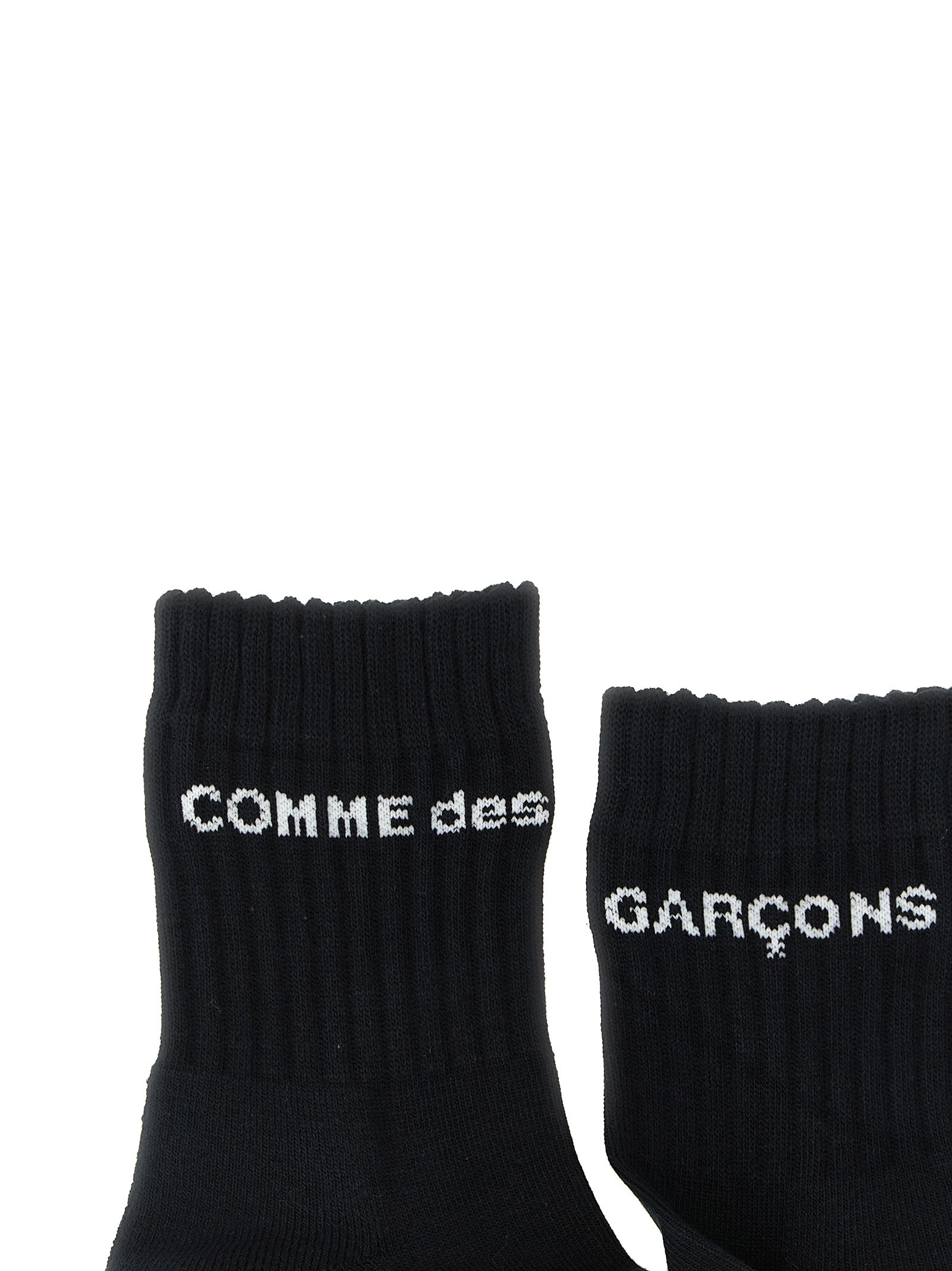 Socks by Comme Des Garçons for men in cotton bicolour, black & white features a snug silhouette, artfully capturing the essence of the snug Men's Cotton Socks design for a sophisticated look.
