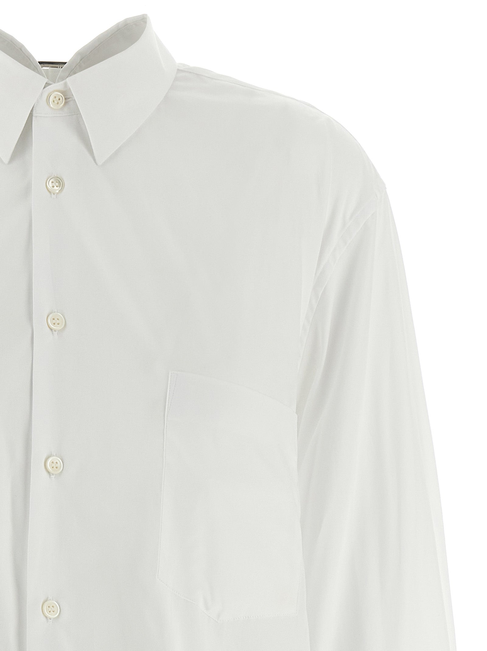 Blouse by Comme Des Garçons for women in cotton white, featuring a nuanced and nuanced for a sophisticated finish.