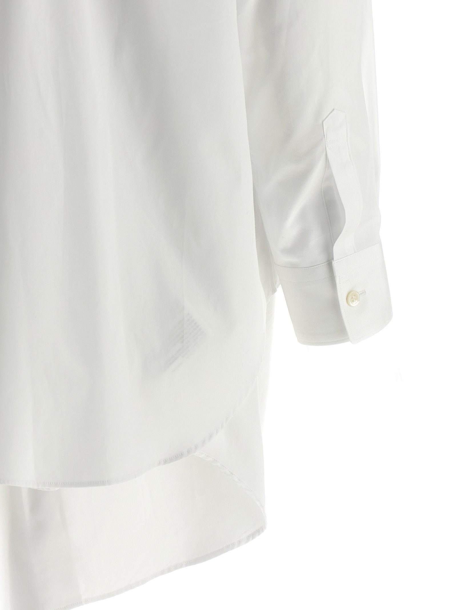 Blouse by Comme Des Garçons for women in cotton white showcases a sleek silhouette, elegantly detailed with a sleek and for a sleek finish.