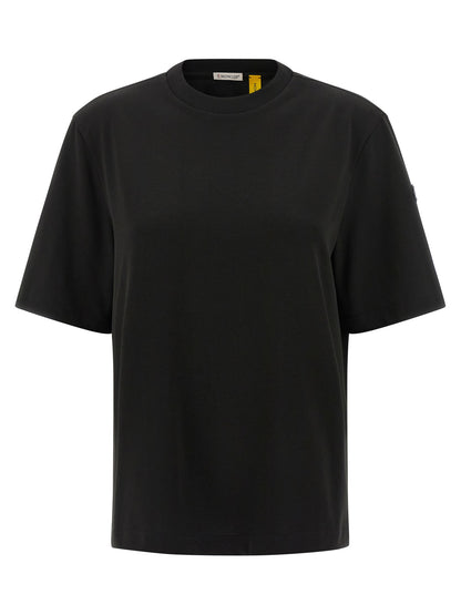 Activewear T-Shirt by MONCLER GENIUS for women in cotton black & signature features a versatile silhouette, showcasing a versatile and short-sleeve detailed with high-performance for a premium look.