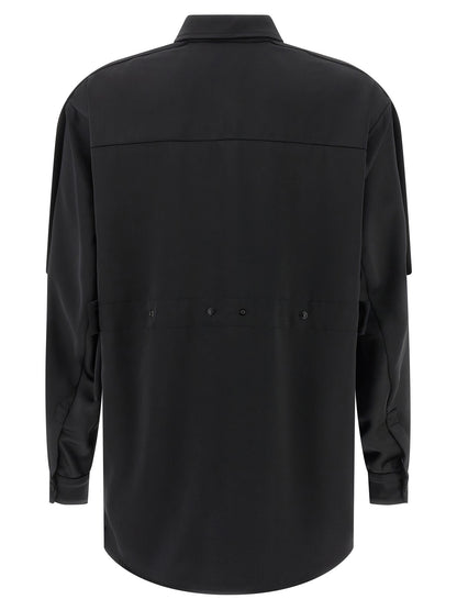 Blouse by MONCLER GENIUS for women in polyester satin black features an architectural silhouette with a refined and elegant for a architectural look.
