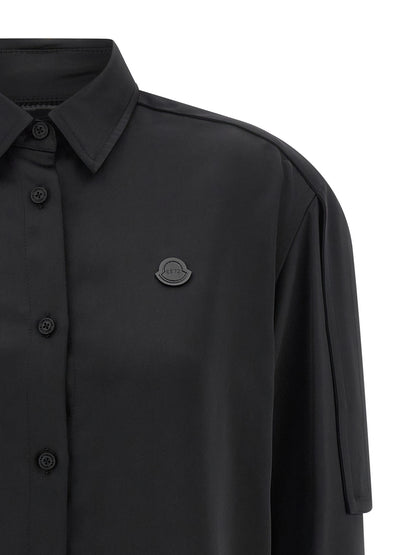 Blouse by MONCLER GENIUS for women in polyester satin black showcases a sharp silhouette, elegantly detailed with a sharp and sharp .