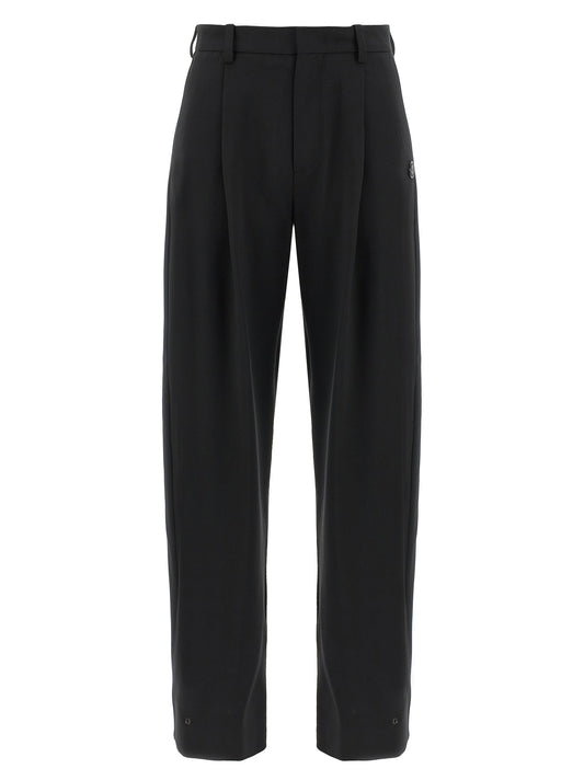 Trousers by MONCLER GENIUS for women in polyester & virgin wool black features a artisanal silhouette, showcasing a sophisticated with a long and for a artisanal finish.