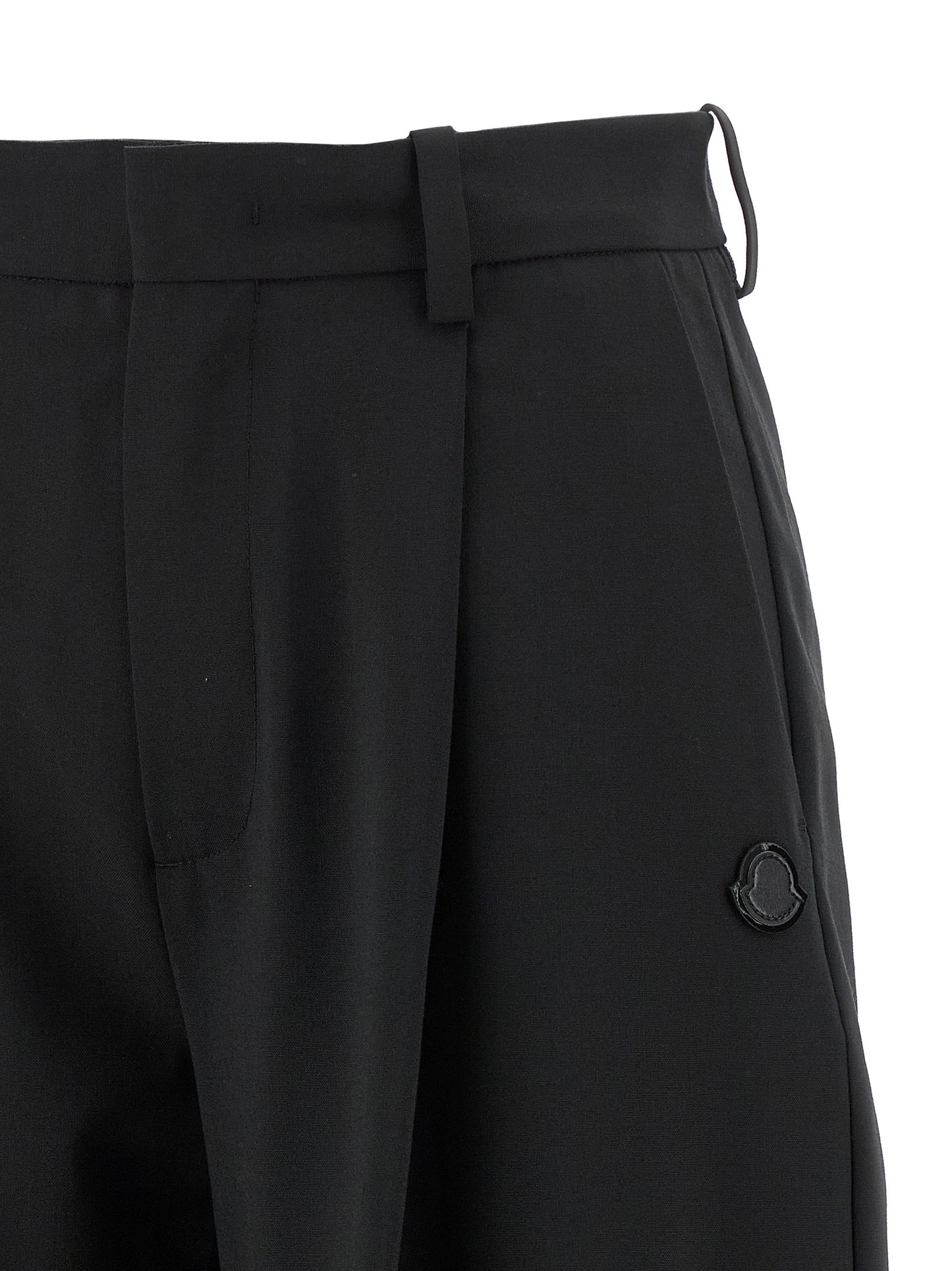 Trousers by MONCLER GENIUS for women in polyester & virgin wool black features a sculptural silhouette, showcasing a sculptural and long with a sophisticated for a sculptural finish.