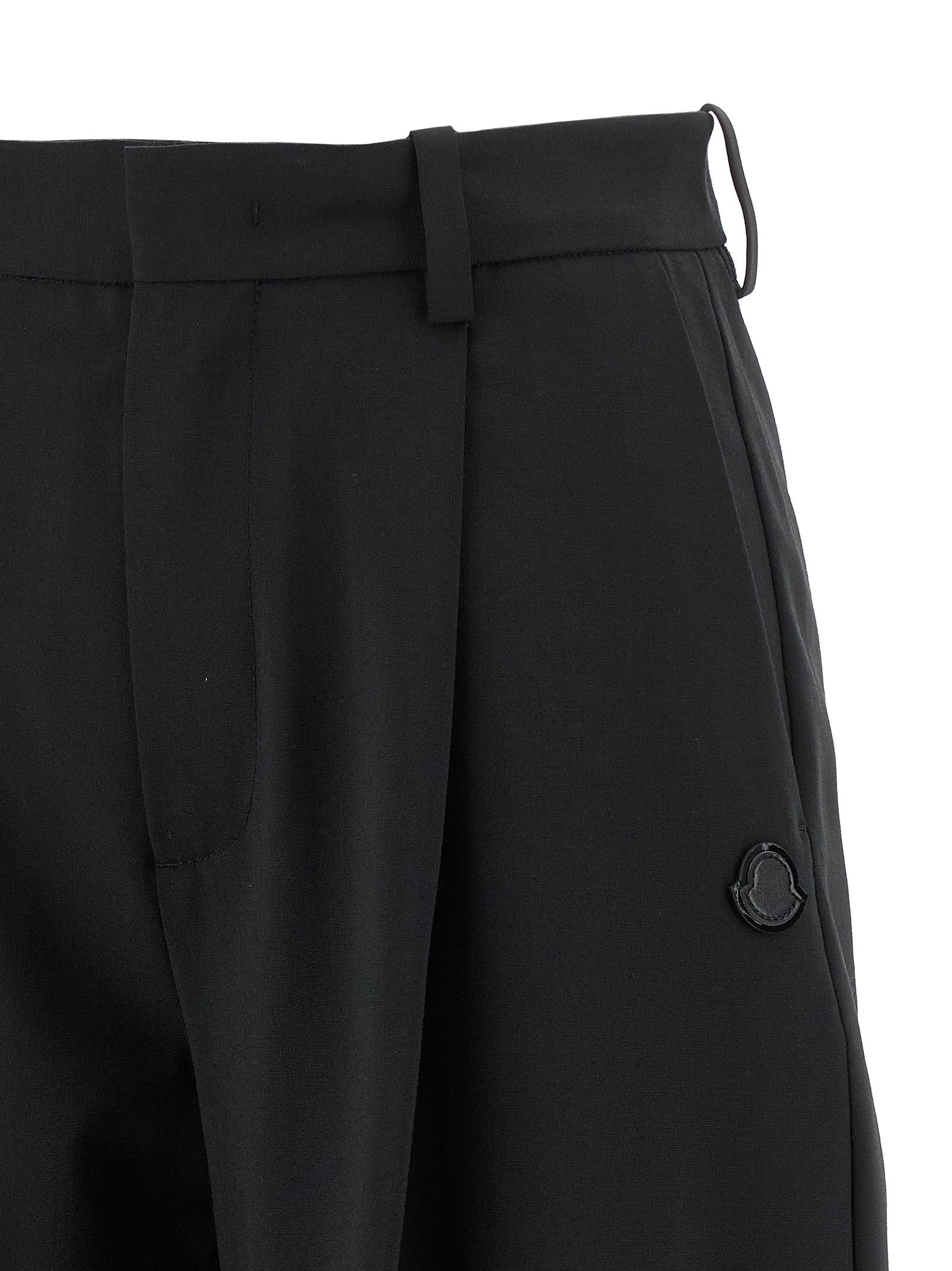 Trousers by MONCLER GENIUS for women in polyester & virgin wool black features a sculptural silhouette, showcasing a sculptural and long with a sophisticated for a sculptural finish.