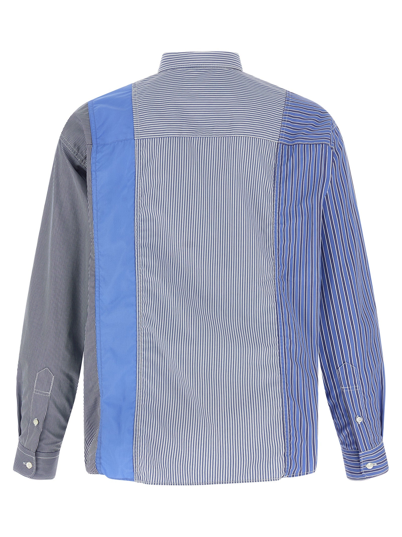 Shirt by Comme Des Garçons for men in cotton blue, patterned & patchwork showcases a sharp silhouette, elegantly detailed with a sharp and sharp .