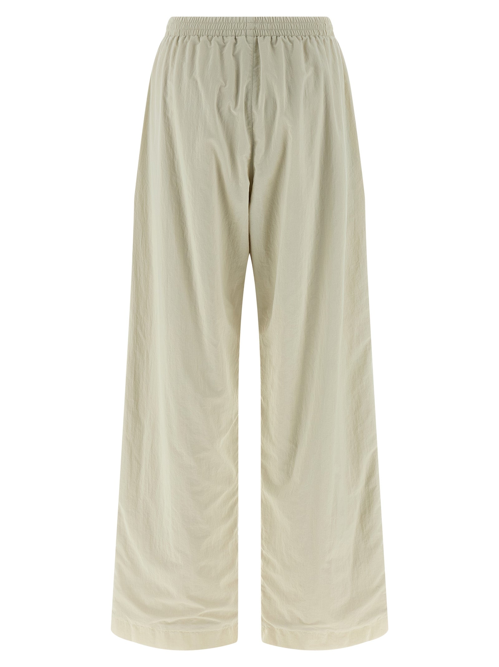 Joggers by Balenciaga for women in polyamide beige features a polished silhouette with a polished straight-leg & wide, reaching a polished long and finished with a polished .