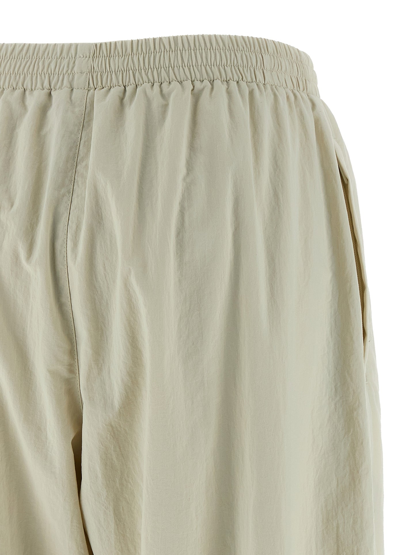 Joggers by Balenciaga for women in polyamide beige features an refined tailoring silhouette, showcasing a premium straight-leg & wide with a and long cut for a refined tailoring look.