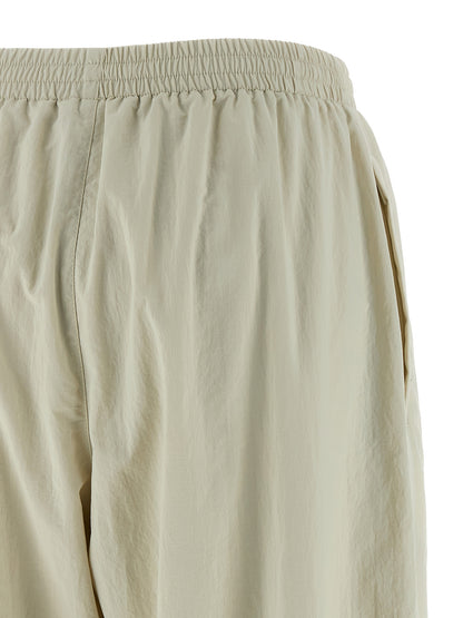 Joggers by Balenciaga for women in polyamide beige features an refined tailoring silhouette, showcasing a premium straight-leg & wide with a and long cut for a refined tailoring look.