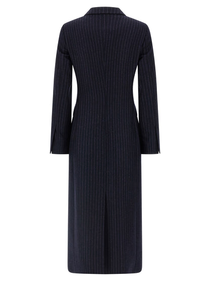 Overcoat by Alberto Biani for women in virgin wool blue showcases a enveloping silhouette, detailed with distinctive pockets and a enveloping wrap neckline.