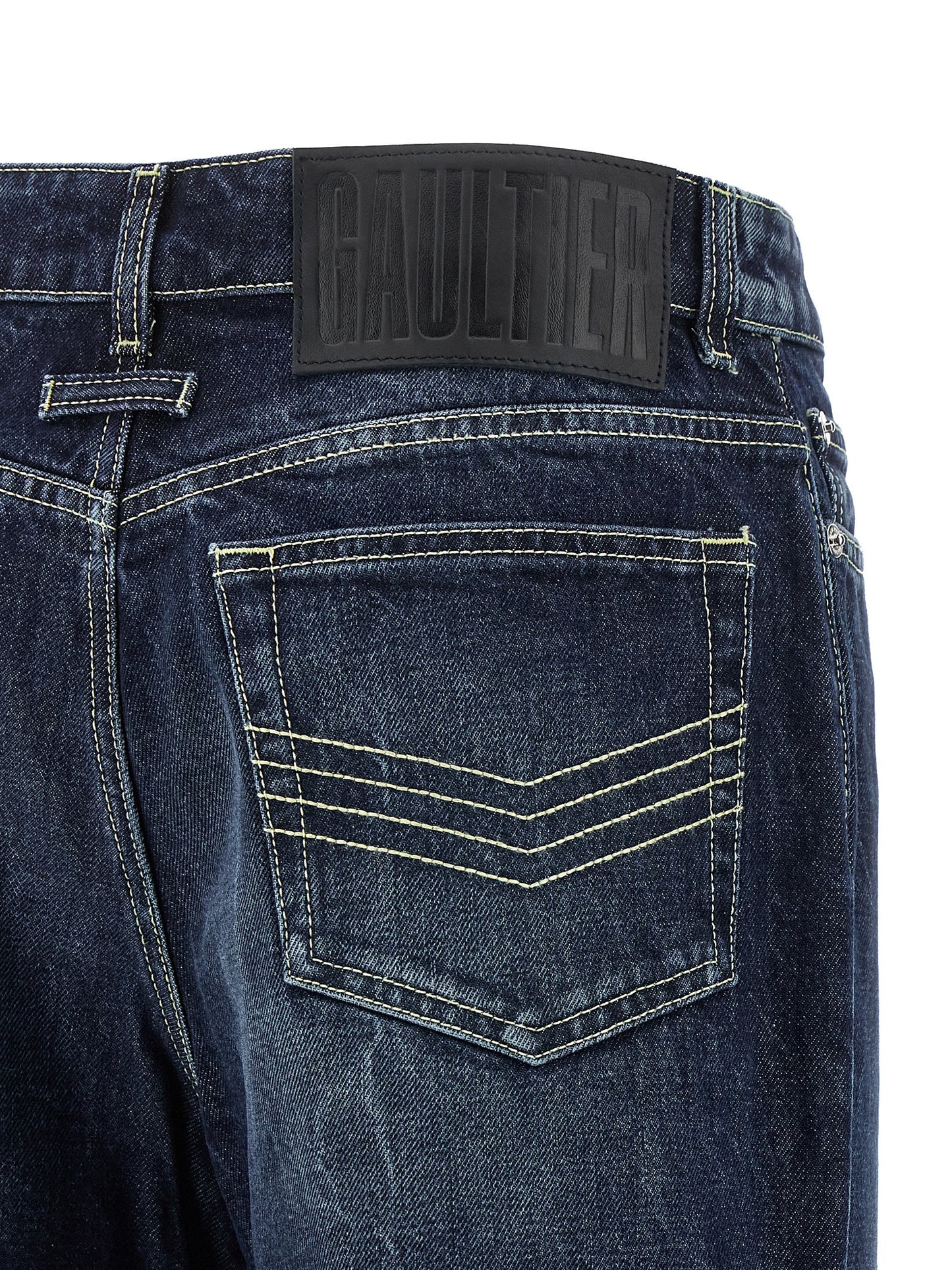 Jeans by Jean Paul Gaultier for women in cotton denim blue features an sartorial wide and long with a cut for a sartorial finish.