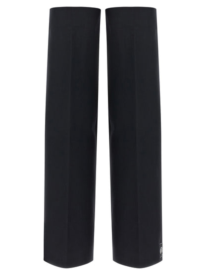 These Socks by Jean Paul Gaultier for women in polyester & virgin wool blue & signature present a utilitarian silhouette from the Women's Polyester & Virgin Wool Socks collection, offering a utilitarian fit and refined aesthetic.