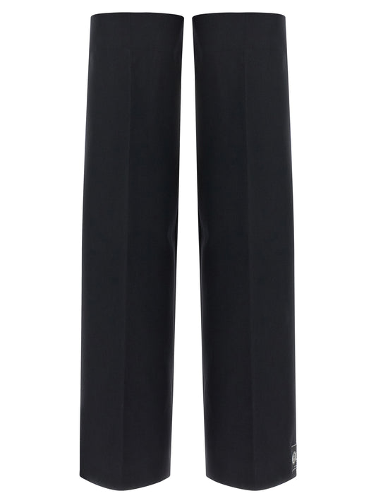 These Socks by Jean Paul Gaultier for women in polyester & virgin wool blue & signature present a utilitarian silhouette from the Women's Polyester & Virgin Wool Socks collection, offering a utilitarian fit and refined aesthetic.