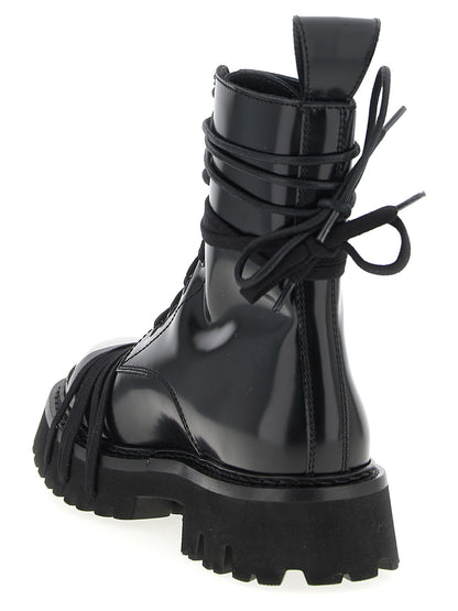 Lace-Up Combat Boots by Moschino for women in calfskin leather black showcases a ergonomic silhouette from the Women's Calfskin Leather Lace-Up Combat Boots collection, featuring a ergonomic and a ergonomic .