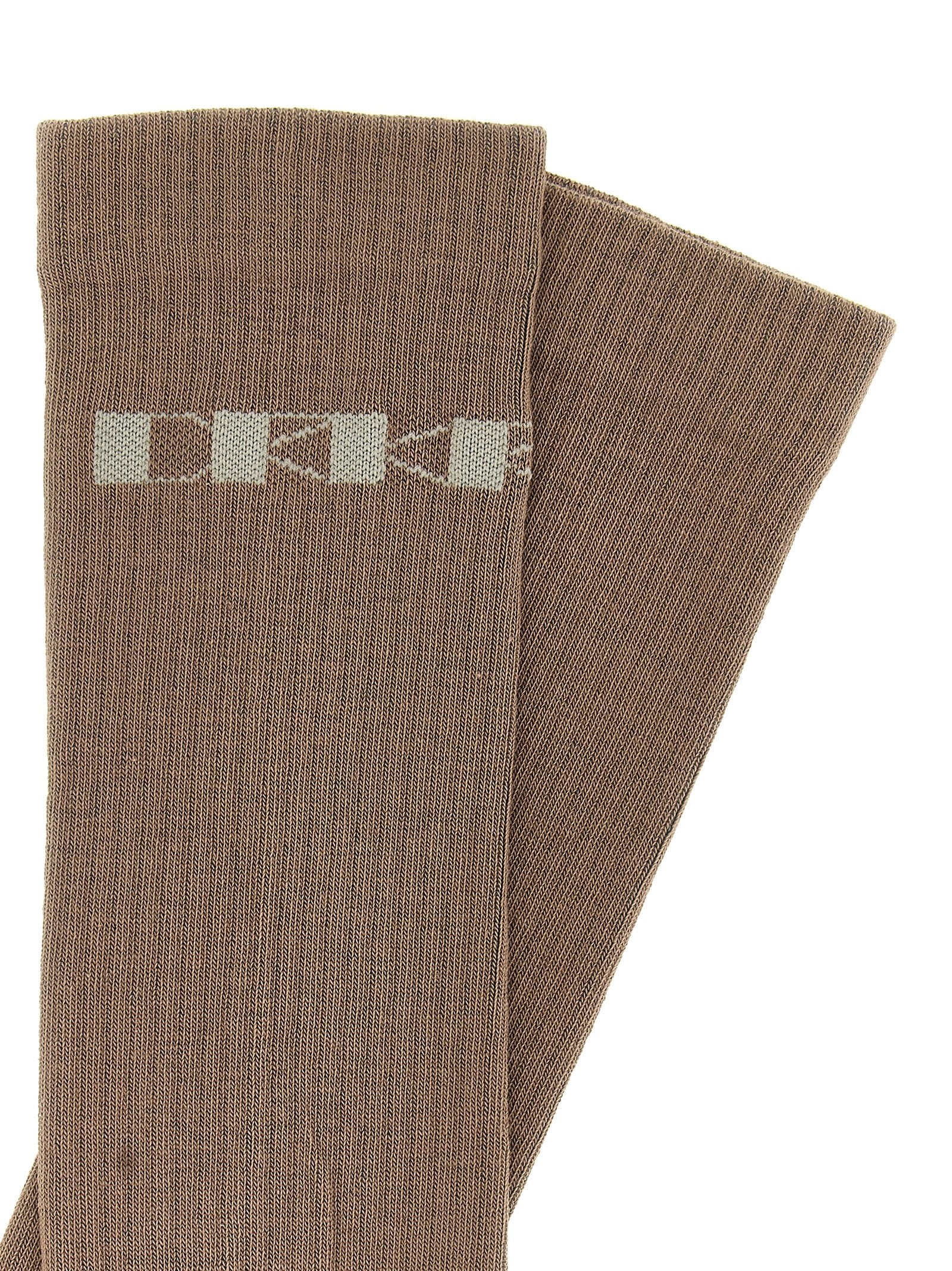 Socks by DRKSHDW for women in stretch cotton & nylon beige & jacquard features a contemporary knit construction, showcasing the sophisticated design of this Women's Stretch Cotton & Nylon Socks with its contemporary finish.