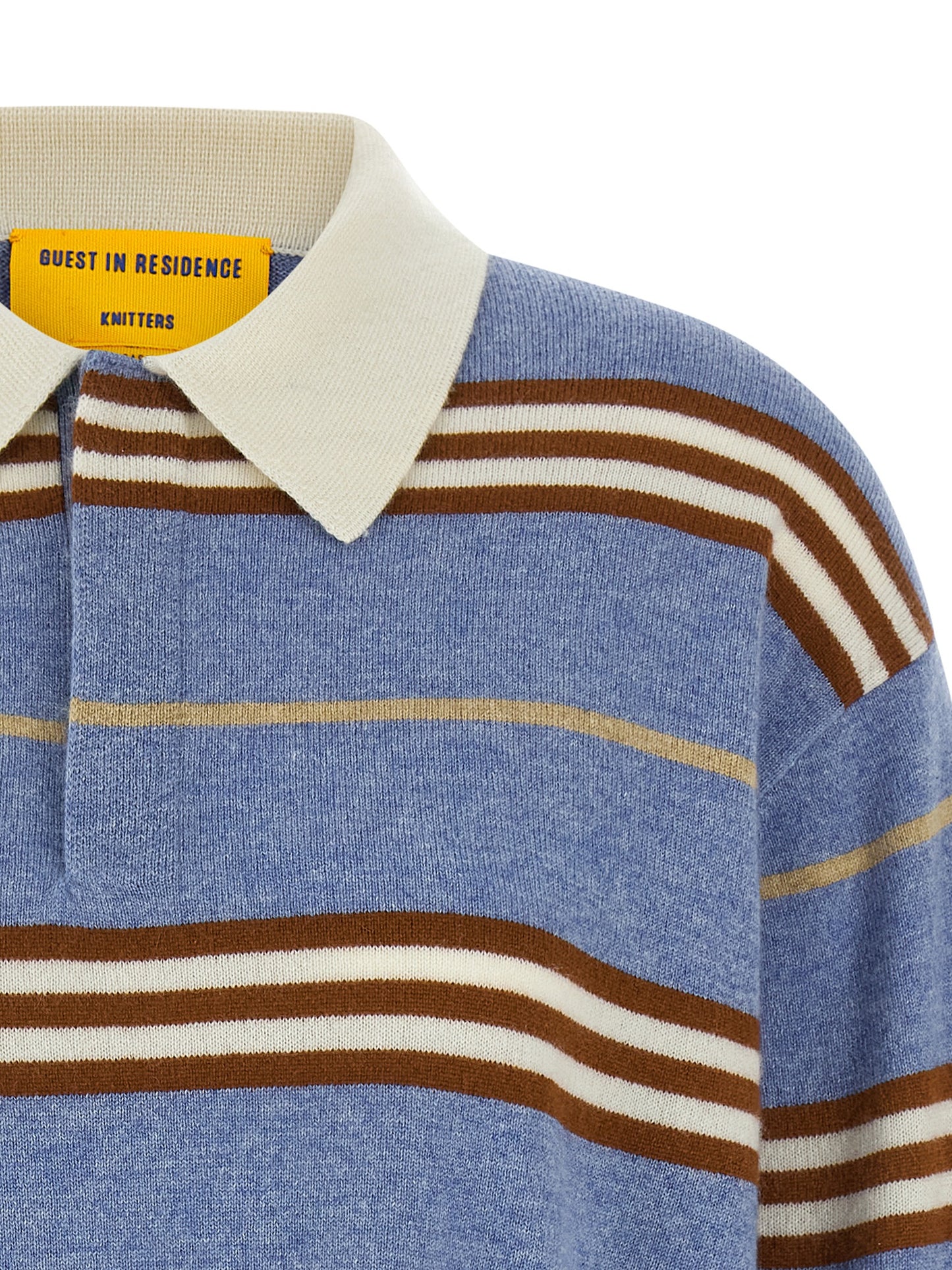 This Polo Shirt by Guest in Residence for women in cashmere light-blue & striped presents a flawless silhouette, showcasing flawless detailing and a refined asymmetric neckline for a truly flawless aesthetic.